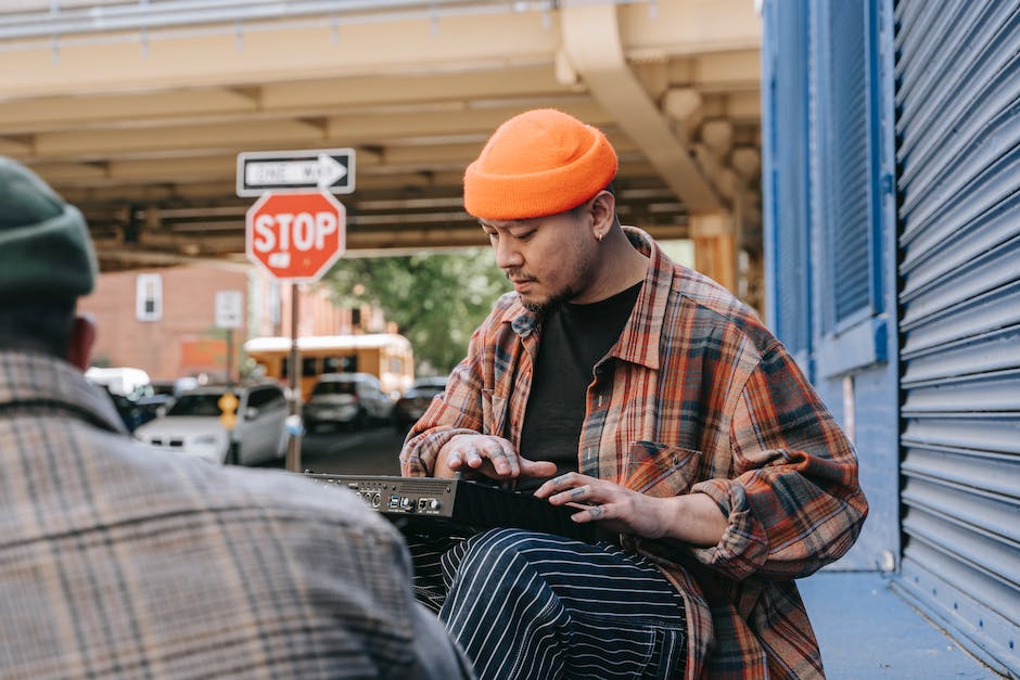 Man Playing Drum Machine